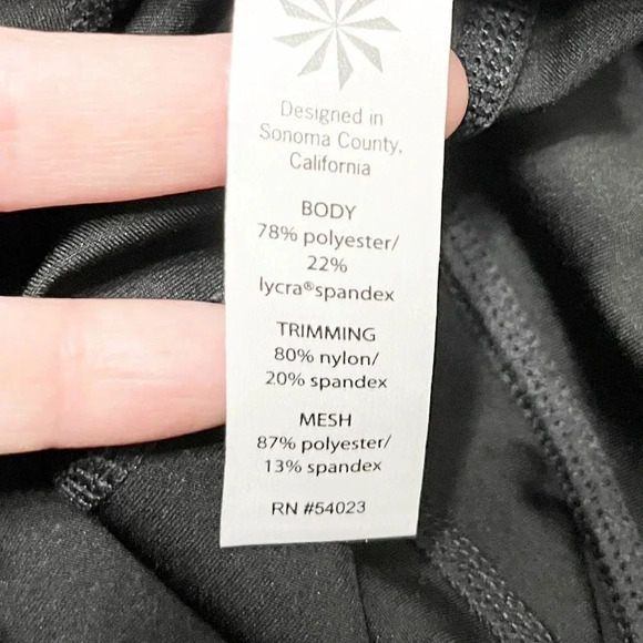 Athleta Black and White Cropped Leggings with Laser Cut Details Women's Small - Picture 6 of 7